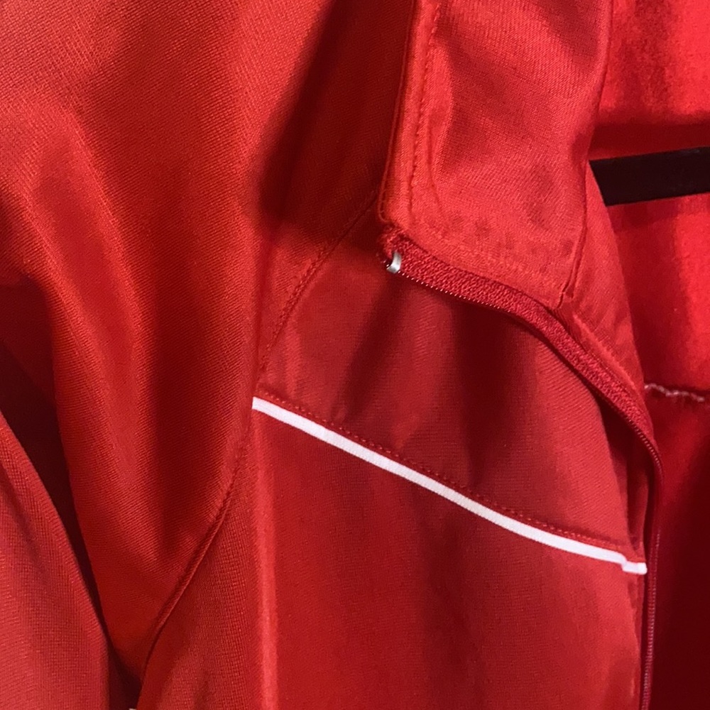 Red jacket. Size L.